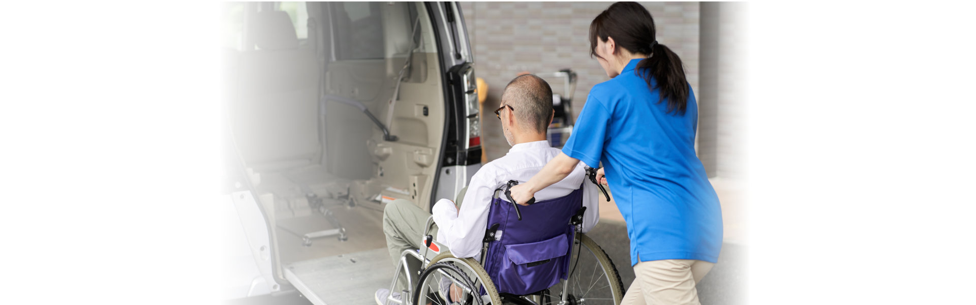 A caregiver who puts an elderly person in a long-term care taxi